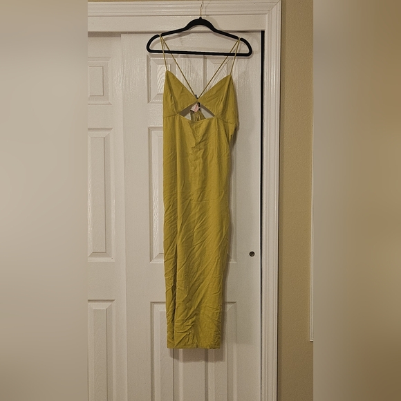 Neon green maxi dress with pockets and front cutout from the Future Collection - Picture 2 of 2